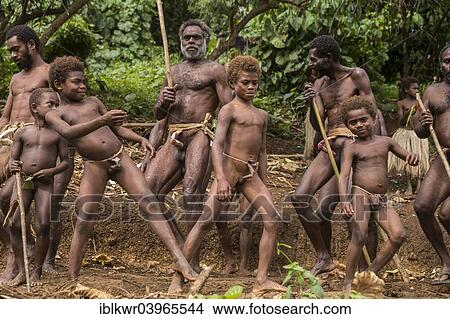 Picture - "Men and boys of the Sa people dancing at the Land diving ceremony, Pentecost Island, Vanuatu, Oceania". Fotosearch