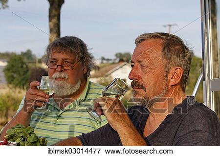 "Men drinking an aperitif, Girancourt, Epinal, Lorraine, Departement Vosges, France, Europe" View Large Photo Image Stock Photo - "Men drinking an aperitif, Girancourt, Epinal, Lorraine, Departement Vosges, France, Europe". Fotosearch