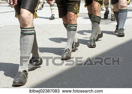 Stock Image - "Men in traditional Bavarian costume, Lederhosen, costume parade celebrating the 90th anniversary of Ebersberg costume society, Bavaria, Germany, Europe". Fotosearch