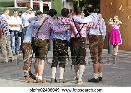 "Men in traditional Bavarian costume having photo taken, Oktoberfest, Munich, Upper Bavaria, Germany, Europe" View Large Photo Image Stock Photo - "Men in traditional Bavarian costume having photo taken, Oktoberfest, Munich, Upper Bavaria, Germany, Europe". Fotosearch