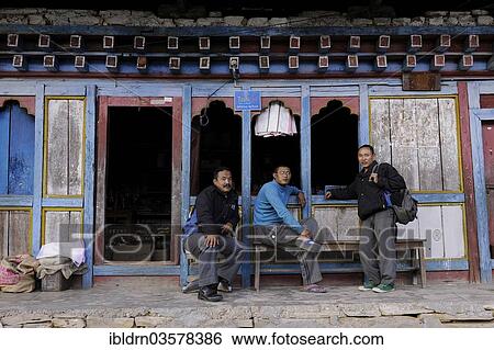 "Men outside a shop in the town centre of Mongar, Mongar, Mongar District, Bhutan, Asia" View Large Photo Image Stock Photograph - "Men outside a shop in the town centre of Mongar, Mongar, Mongar District, Bhutan, Asia". Fotosearch