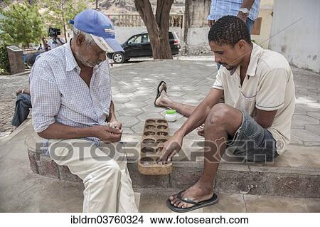 "Men playing a board game, Santo Antao, Cape Verde, Africa" View Large Photo Image Picture - "Men playing a board game, Santo Antao, Cape Verde, Africa". Fotosearch