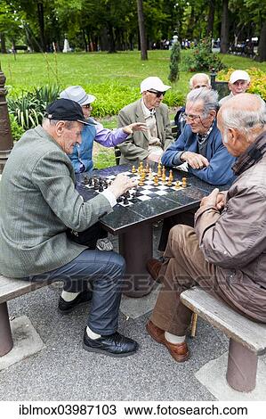 "Men playing chess, New Belgrade or Novi Beograd, Belgrade, Serbia, Europe" View Large Photo Image Stock Image - "Men playing chess, New Belgrade or Novi Beograd, Belgrade, Serbia, Europe". Fotosearch