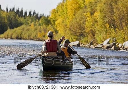 "Men rowing a canoe, Tanana River, near Fairbanks, Alaska, USA" View Large Photo Image Stock Image - "Men rowing a canoe, Tanana River, near Fairbanks, Alaska, USA". Fotosearch