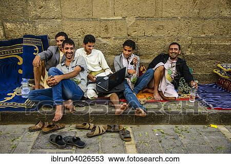 "Men sitting in front of a house in the old city, Sana'a, Yemen, Asia" View Large Photo Image Stock Image - "Men sitting in front of a house in the old city, Sana'a, Yemen, Asia". Fotosearch