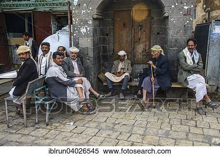 "Men sitting in front of a house in the old city, Sana'a, Yemen, Asia" View Large Photo Image Stock Photography - "Men sitting in front of a house in the old city, Sana'a, Yemen, Asia". Fotosearch