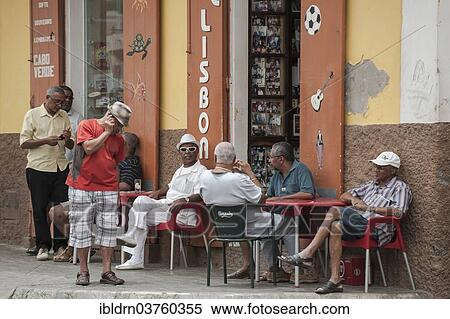 "Men sitting in the Lisboa Cafe in the historic centre of Mindelo, Sao Vicente, Cape Verde, Africa" View Large Photo Image Stock Photography - "Men sitting in the Lisboa Cafe in the historic centre of Mindelo, Sao Vicente, Cape Verde, Africa". Fotosearch