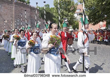 "Menuettgruppe dance group with fishing girls and white fishermen during the fishing dance, Fischerstechen or water jousting festival, Ulm, Baden-Wurttemberg, Germany, Europe" View Large Photo Image Stock Photo - "Menuettgruppe dance group with fishing girls and white fishermen during the fishing dance, Fischerstechen or water jousting festival, Ulm, Baden-Wurttemberg, Germany, Europe". Fotosearch