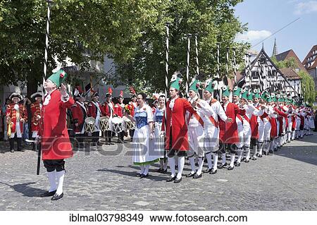 "Menuettgruppe dance group with fishing girls and white fishermen during the fishing dance, Fischerstechen or water jousting festival, Ulm, Baden-Wurttemberg, Germany, Europe" View Large Photo Image Stock Photo - "Menuettgruppe dance group with fishing girls and white fishermen during the fishing dance, Fischerstechen or water jousting festival, Ulm, Baden-Wurttemberg, Germany, Europe". Fotosearch