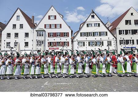 "Menuettgruppe dance group with fishing girls and white fishermen during the fishing dance, Fischerstechen or water jousting festival, Ulm, Baden-Wurttemberg, Germany, Europe" View Large Photo Image Stock Photo - "Menuettgruppe dance group with fishing girls and white fishermen during the fishing dance, Fischerstechen or water jousting festival, Ulm, Baden-Wurttemberg, Germany, Europe". Fotosearch