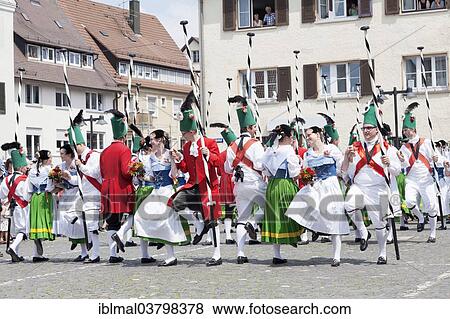 Stock Photo - "Menuettgruppe dance group with fishing girls and white fishermen during the fishing dance, Fischerstechen or water jousting festival, Ulm, Baden-Wurttemberg, Germany, Europe". Fotosearch