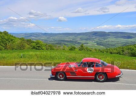 "Mercedes Benz 300 SL, W 198, classic car, racing car, car race, Mille Miglia 2014, Miglia 1000, 1000 Miles, near Radicofani, Tuscany, Italy, Europe" View Large Photo Image Stock Photo - "Mercedes Benz 300 SL, W 198, classic car, racing car, car race, Mille Miglia 2014, Miglia 1000, 1000 Miles, near Radicofani, Tuscany, Italy, Europe". Fotosearch