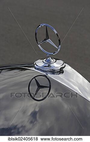 Stock Photo - "Mercedes star, with a reflection". Fotosearch