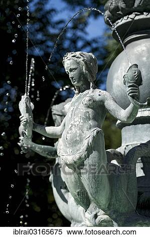"Mermaid holding fish in an Art Nouveau style fountain, Fortuna Fountain by Karl Killer, Isartorplatz, Munich, Upper Bavaria, Bavaria, Germany, Europe" View Large Photo Image Stock Photography - "Mermaid holding fish in an Art Nouveau style fountain, Fortuna Fountain by Karl Killer, Isartorplatz, Munich, Upper Bavaria, Bavaria, Germany, Europe". Fotosearch