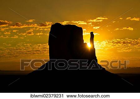 Stock Image - "Mesa of West Mitten Butte at sunrise, Monument Valley, Navajo Tribal Park, Navajo Nation Reservation, Arizona, Utah, Southwest, United States of America, USA". Fotosearch