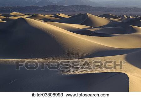 "Mesquite Flat Sand Dunes in the early morning, foothills of the Amargosa Range in the back, Death Valley, Death Valley National Park, California, USA" View Large Photo Image Stock Image - "Mesquite Flat Sand Dunes in the early morning, foothills of the Amargosa Range in the back, Death Valley, Death Valley National Park, California, USA". Fotosearch
