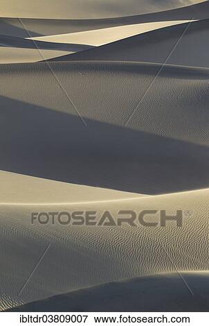 Stock Photo - "Mesquite Flat Sand Dunes in the evening, Death Valley, Death Valley National Park, California, USA". Fotosearch