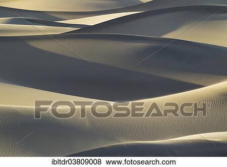 Stock Photo - "Mesquite Flat Sand Dunes in the evening, Death Valley, Death Valley National Park, California, USA". Fotosearch
