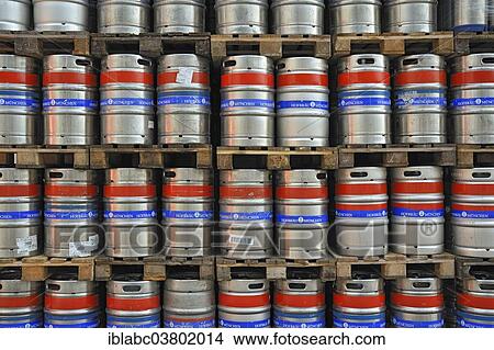 Picture - "Metal beer kegs, barrels, stacked on pallets, Bavaria, Germany, Europe". Fotosearch