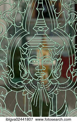 Stock Photo - "Metal mesh gate with a representation of Buddha in the Royal Palace, Phnom Penh, Cambodia, Southeast Asia, Asia". Fotosearch
