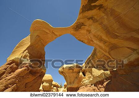 "Metate Arch, natural arch, Devil's Garden, eroded hoodoos and Entrada Sandstone rock formations, Goblins, Hole-In-The-Rock-Road, Grand Staircase-Escalante National Monument, GSENM, Utah, Southwestern USA, USA" View Large Photo Image Picture - "Metate Arch, natural arch, Devil's Garden, eroded hoodoos and Entrada Sandstone rock formations, Goblins, Hole-In-The-Rock-Road, Grand Staircase-Escalante National Monument, GSENM, Utah, Southwestern USA, USA". Fotosearch