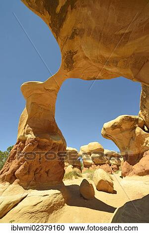 "Metate Arch"""", natural arch, Devil's Garden, eroded hoodoos and Entrada Sandstone rock formations, Goblins, Hole-In-The-Rock-Road, Grand Staircase-Escalante National Monument, GSENM, Utah, Southwestern USA, USA" View Large Photo Image Stock Image - "Metate Arch"""", natural arch, Devil's Garden, eroded hoodoos and Entrada Sandstone rock formations, Goblins, Hole-In-The-Rock-Road, Grand Staircase-Escalante National Monument, GSENM, Utah, Southwestern USA, USA". Fotosearch