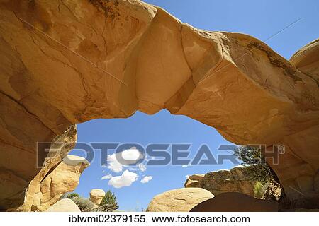 "Metate Arch"""", natural arch, Devil's Garden, eroded hoodoos and Entrada Sandstone rock formations, Goblins, Hole-In-The-Rock-Road, Grand Staircase-Escalante National Monument, GSENM, Utah, Southwestern USA, USA" View Large Photo Image Stock Photography - "Metate Arch"""", natural arch, Devil's Garden, eroded hoodoos and Entrada Sandstone rock formations, Goblins, Hole-In-The-Rock-Road, Grand Staircase-Escalante National Monument, GSENM, Utah, Southwestern USA, USA". Fotosearch