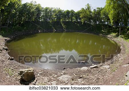 Stock Image - "Meteorite crater, Kaali, Kuressaare, Saaremaa, Estonia, Baltic States, Europe". Fotosearch