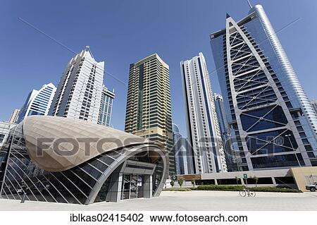 Metro Station, Jumeirah Lake Towers, Indigo Icon building, Dubai, United Arab Emirates, Middle East, Asia View Large Photo Image Stock Image - Metro Station, Jumeirah Lake Towers, Indigo Icon building, Dubai, United Arab Emirates, Middle East, Asia. Fotosearch