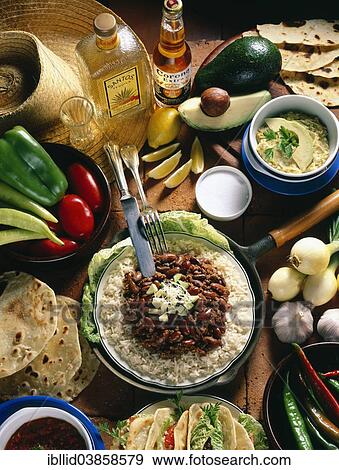 "Mexican national cuisine, quesadillas, stuffed tortillas, guacamole, chili con carne with rice, tequila, Corona beer" View Large Photo Image Stock Photo - "Mexican national cuisine, quesadillas, stuffed tortillas, guacamole, chili con carne with rice, tequila, Corona beer". Fotosearch