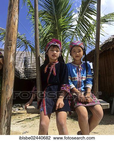 Stock Image - "Miao children wearing traditional ethnic costumes, Hainan, China, Asia". Fotosearch