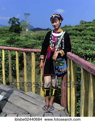 Picture - "Miao girl wearing a traditional ethnic costume, Hainan, China, Asia". Fotosearch