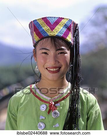 "Miao girl wearing a traditional ethnic costume, portrait, Hainan, China, Asia" View Large Photo Image Stock Photo - "Miao girl wearing a traditional ethnic costume, portrait, Hainan, China, Asia". Fotosearch