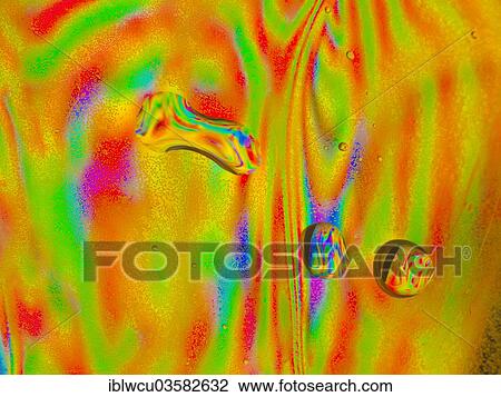 "Microscopic water droplets on the inside of a plastic water bottle, with light refracting in all the colours of the rainbow" View Large Photo Image Stock Image - "Microscopic water droplets on the inside of a plastic water bottle, with light refracting in all the colours of the rainbow". Fotosearch