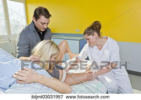 "Midwife caring for a pregnant woman during labour, Germany, Europe" View Large Photo Image Stock Photo - "Midwife caring for a pregnant woman during labour, Germany, Europe". Fotosearch