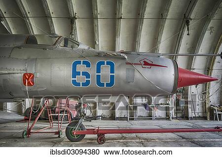 "MIG-21 SMT aircraft, a relatively rare version in Germany, left behind in 1993 by the Soviet air forces during their withdrawal, in a hangar at the Altenburg Nobitz Airfield, Nobitz, Altenburg, Thuringia, Germany, Europe" View Large Photo Image Stock Image - "MIG-21 SMT aircraft, a relatively rare version in Germany, left behind in 1993 by the Soviet air forces during their withdrawal, in a hangar at the Altenburg Nobitz Airfield, Nobitz, Altenburg, Thuringia, Germany, Europe". Fotosearch