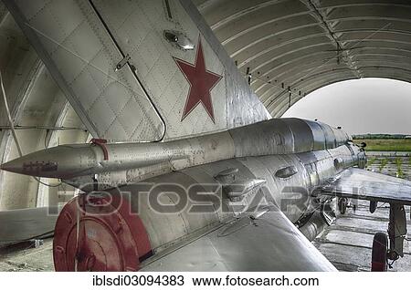 "MIG-21 SMT aircraft, a relatively rare version in Germany, left behind in 1993 by the Soviet air forces during their withdrawal, in a hangar at the Altenburg Nobitz Airfield, Nobitz, Altenburg, Thuringia, Germany, Europe" View Large Photo Image Stock Image - "MIG-21 SMT aircraft, a relatively rare version in Germany, left behind in 1993 by the Soviet air forces during their withdrawal, in a hangar at the Altenburg Nobitz Airfield, Nobitz, Altenburg, Thuringia, Germany, Europe". Fotosearch