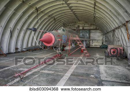 "MIG-21 SMT aircraft, a relatively rare version in Germany, left behind in 1993 by the Soviet air forces during their withdrawal, in a hangar at the Altenburg Nobitz Airfield, Nobitz, Altenburg, Thuringia, Germany, Europe" View Large Photo Image Stock Photo - "MIG-21 SMT aircraft, a relatively rare version in Germany, left behind in 1993 by the Soviet air forces during their withdrawal, in a hangar at the Altenburg Nobitz Airfield, Nobitz, Altenburg, Thuringia, Germany, Europe". Fotosearch