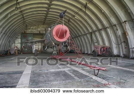 "MIG-21 SMT aircraft, a relatively rare version in Germany, left behind in 1993 by the Soviet air forces during their withdrawal, in a hangar at the Altenburg Nobitz Airfield, Nobitz, Altenburg, Thuringia, Germany, Europe" View Large Photo Image Stock Photo - "MIG-21 SMT aircraft, a relatively rare version in Germany, left behind in 1993 by the Soviet air forces during their withdrawal, in a hangar at the Altenburg Nobitz Airfield, Nobitz, Altenburg, Thuringia, Germany, Europe". Fotosearch