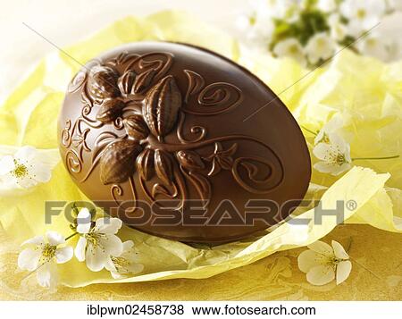 Stock Photo - Milk chocolate Easter egg. Fotosearch