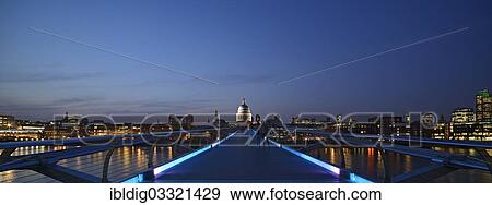 "Millennium Bridge and London skyline at dusk, London, London region, England, United Kingdom, Europe" View Large Photo Image Stock Photo - "Millennium Bridge and London skyline at dusk, London, London region, England, United Kingdom, Europe". Fotosearch