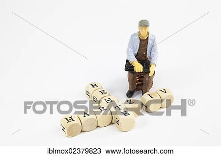 "Miniature figure and letter cubes, worker receiving the """"Hartz IV"""" German income support subsidy, symbolic image for Hartz IV and pension payments" View Large Photo Image Stock Image - "Miniature figure and letter cubes, worker receiving the """"Hartz IV"""" German income support subsidy, symbolic image for Hartz IV and pension payments". Fotosearch