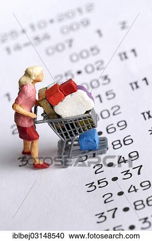 "Miniature figurine of a woman with a shopping chart on a receipt, symbolic image for consumption, France, Europe" View Large Photo Image Stock Image - "Miniature figurine of a woman with a shopping chart on a receipt, symbolic image for consumption, France, Europe". Fotosearch