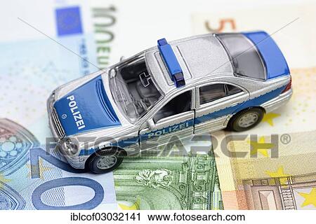 "Miniature police car on euro banknotes, Germany, Europe" View Large Photo Image Stock Image - "Miniature police car on euro banknotes, Germany, Europe". Fotosearch
