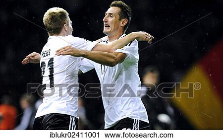 Stock Image - "Miroslav Klose celebrating his goal, 1: 0, with Marco Reus, during the qualifying match for the FIFA World Cup 2014, Germany - Sweden 4: 4, Olympic Stadium, Berlin, Germany, Europe". Fotosearch