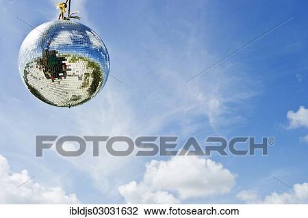 "Mirror ball or disco ball against a blue sky, Amrum, Amrum, North Frisian Islands, Schleswig-Holstein, Germany, Europe" View Large Photo Image Stock Image - "Mirror ball or disco ball against a blue sky, Amrum, Amrum, North Frisian Islands, Schleswig-Holstein, Germany, Europe". Fotosearch