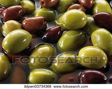 Stock Photo - Mixed green and kalamata olives. Fotosearch