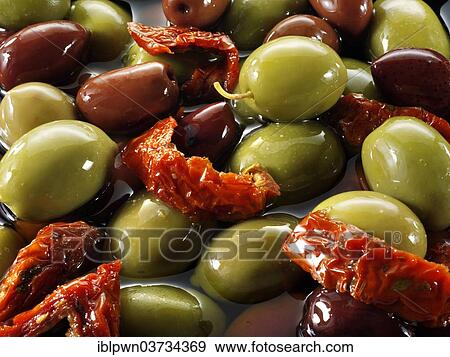 Stock Photo - Mixed green and kalamata olives. Fotosearch