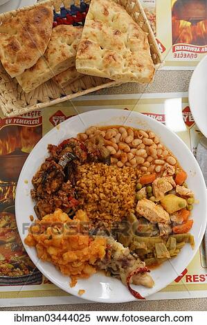 "Mixed typical Turkish food in a Lokanta snack bar, Kusadasi, Aydin province, Aegean region, Turkey, Asia" View Large Photo Image Stock Photography - "Mixed typical Turkish food in a Lokanta snack bar, Kusadasi, Aydin province, Aegean region, Turkey, Asia". Fotosearch