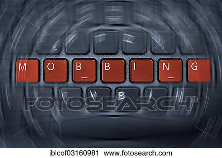 Stock Image - "Mobbing"""", German for bullying, written on a computer keyboard, symbol image for online bullying, Germany, Europe". Fotosearch